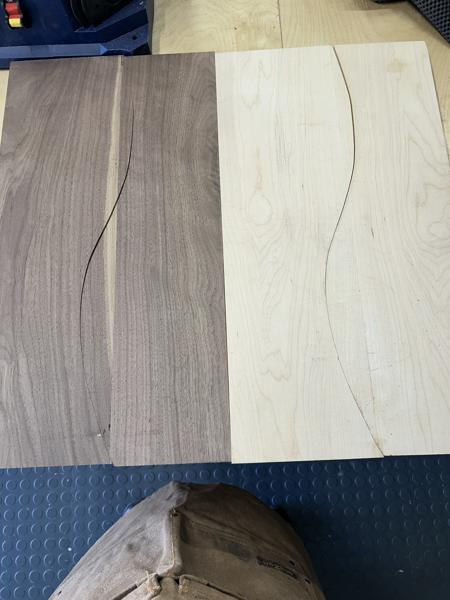 The band-sawn maple and walnut boards separated and shown side-by-side.
